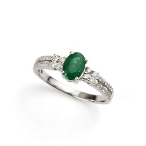 18k White Gold Oval Emerald and 0.30ct Total Diamond Ring